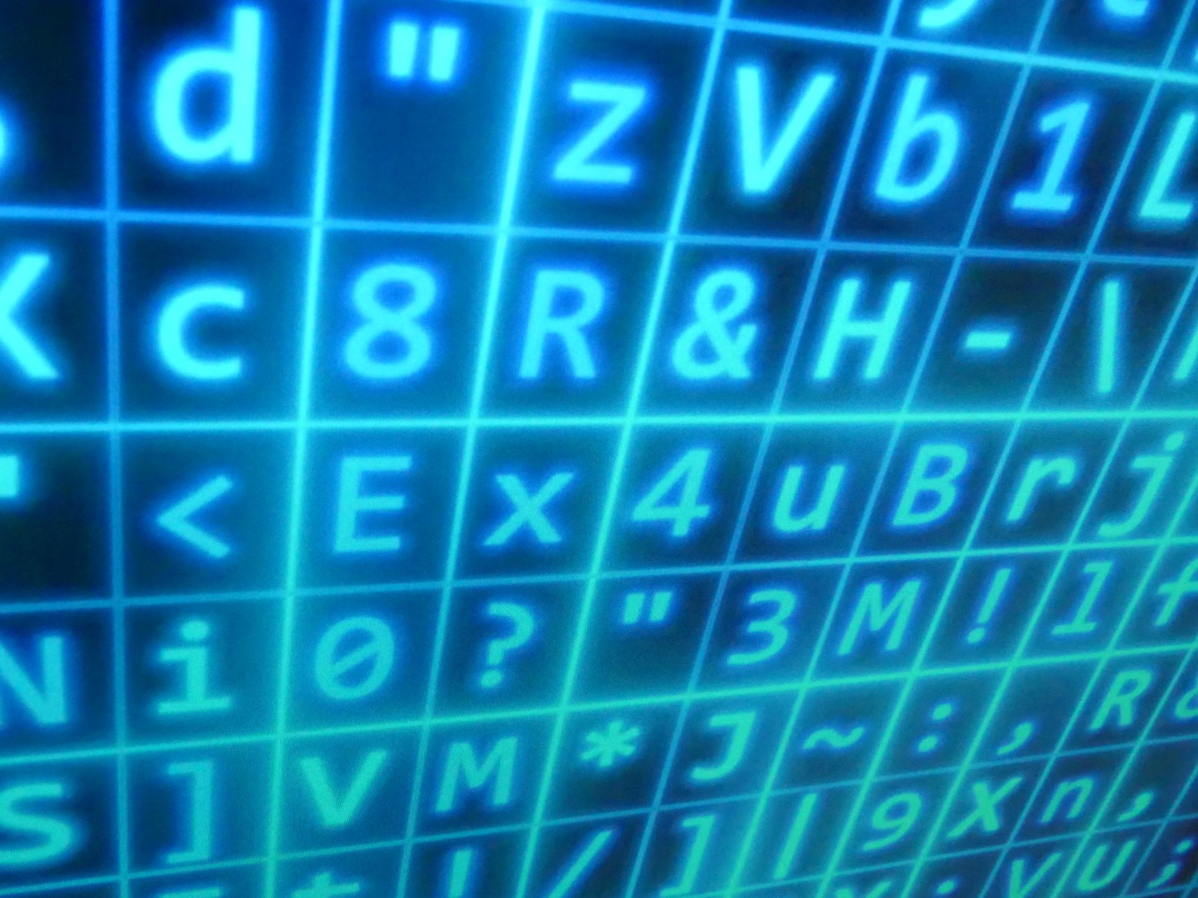High-tech matrix display with blue glowing digital code symbols in rows and columns.